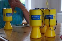Marie Curie collecting pots