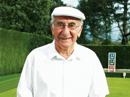 An older man smiling