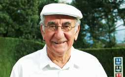 An older man smiling