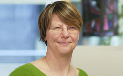 A woman smiling