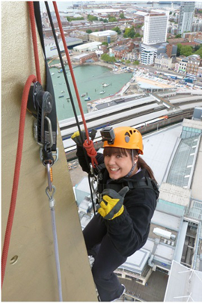 Rebecca abseils 94 meters for The Rowans Hospice