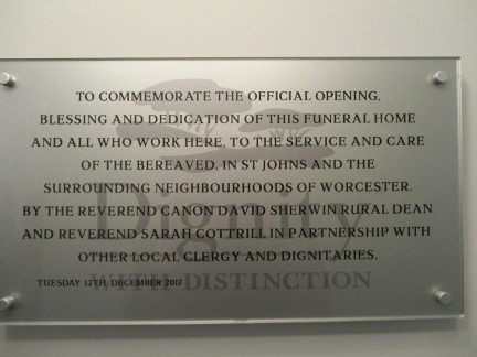 Plaque showing details of the dedication service.