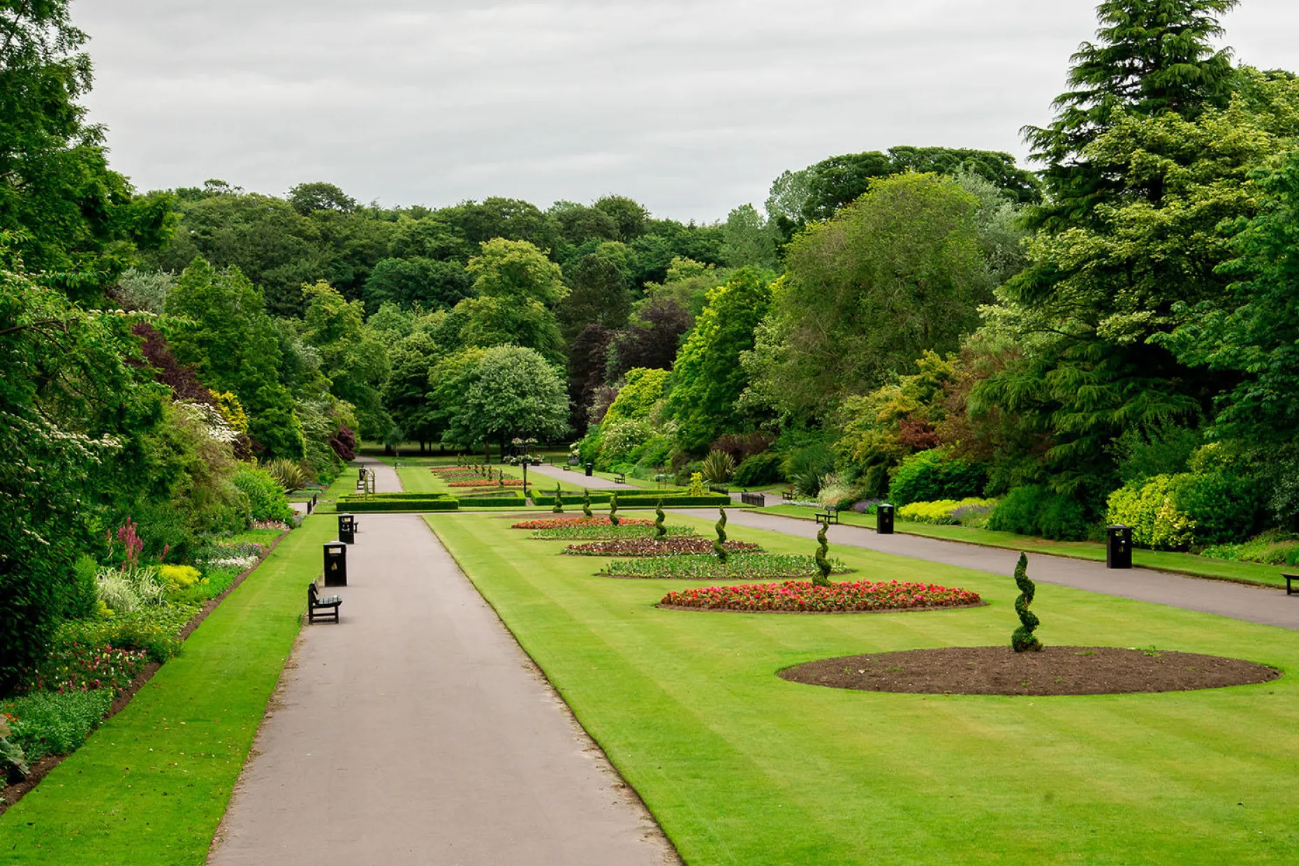 Benches and flower beds in Seaton Park in Aberdeen, Scotland