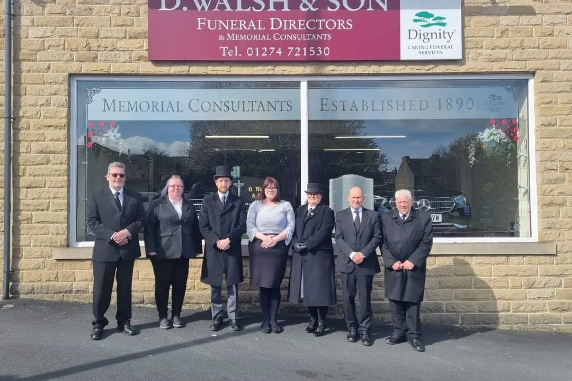 The team outside D Walsh & Son Funeral Directors on Manchester Road, Bradford.